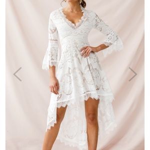 White lace high low bell sleeve dress